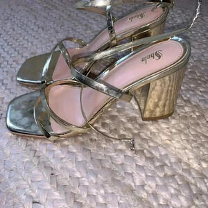 gold shoes with straps size 7 from SHEIN. Worn once!